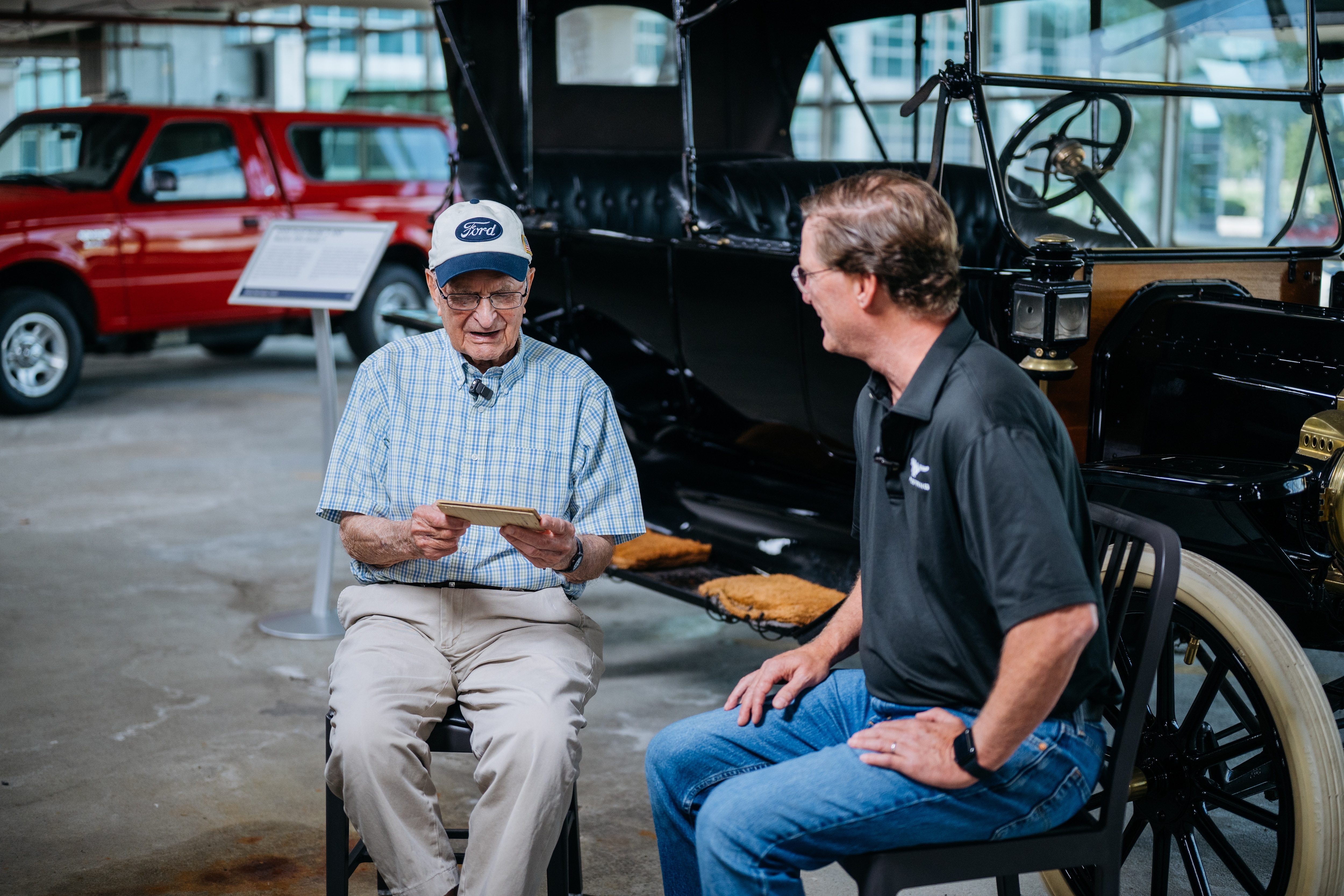 Bill McCubbin, a 102-year-old World War II veteran, marveled as he toured the Heritage Fleet of landmark Ford vehicles. 